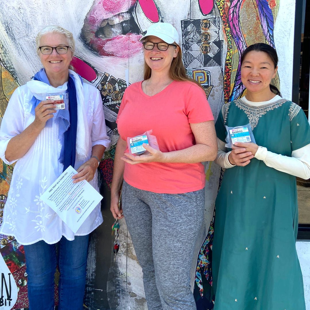 Bandito three smiling women wearing dresses in front of paleo treats store on adams ave normal heights.