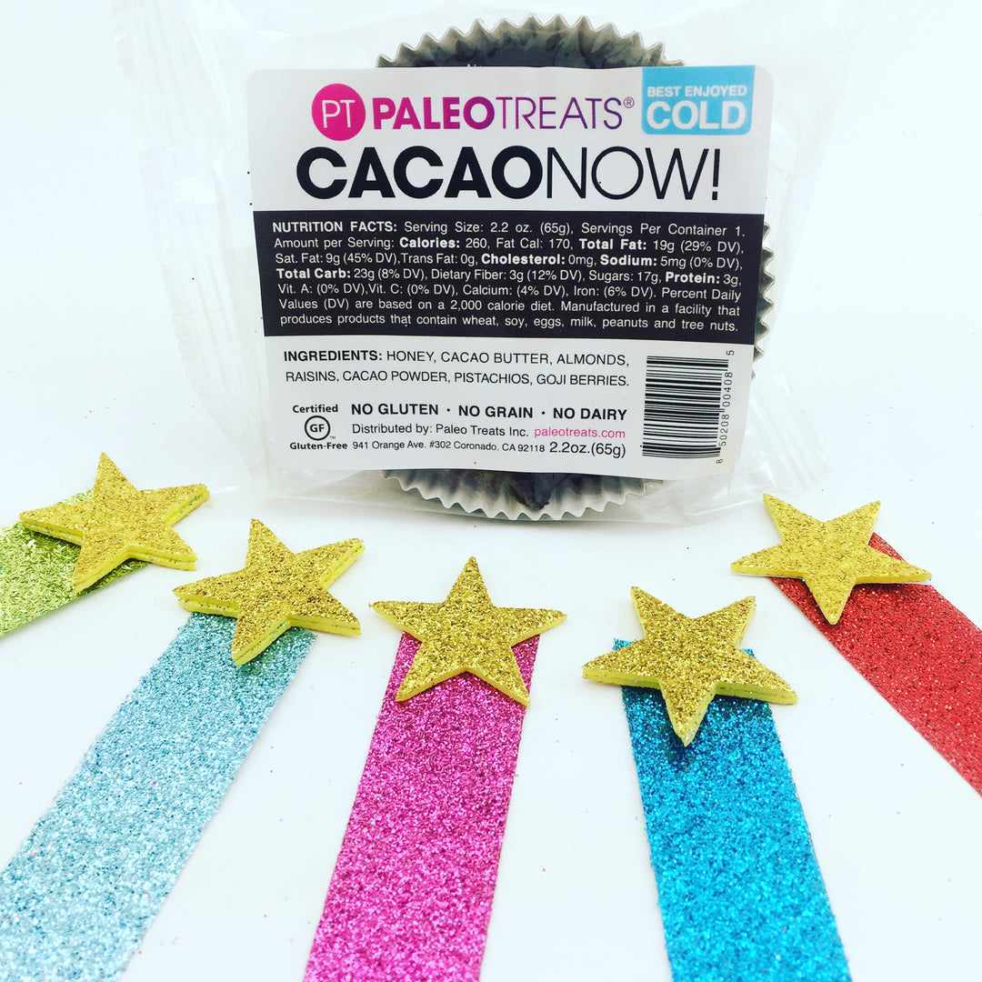 Cacao now paleo chocolate bar with five gold stars and ribbon by Paleo Treats.