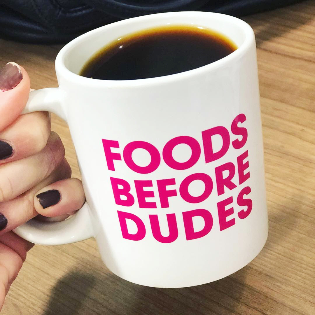 Coffee mug with foods before dudes in pink letters by Paleo Treats.
