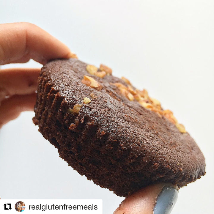Brownie bomb ig of two fingers holding brownie bomb.