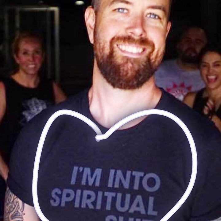 Famous dude wears im into spiritual shit t shirt.