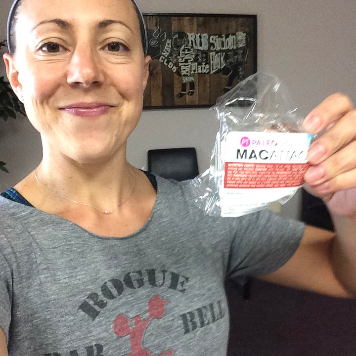 Famous paleo lady holding a mac attack dairy free macaroon.