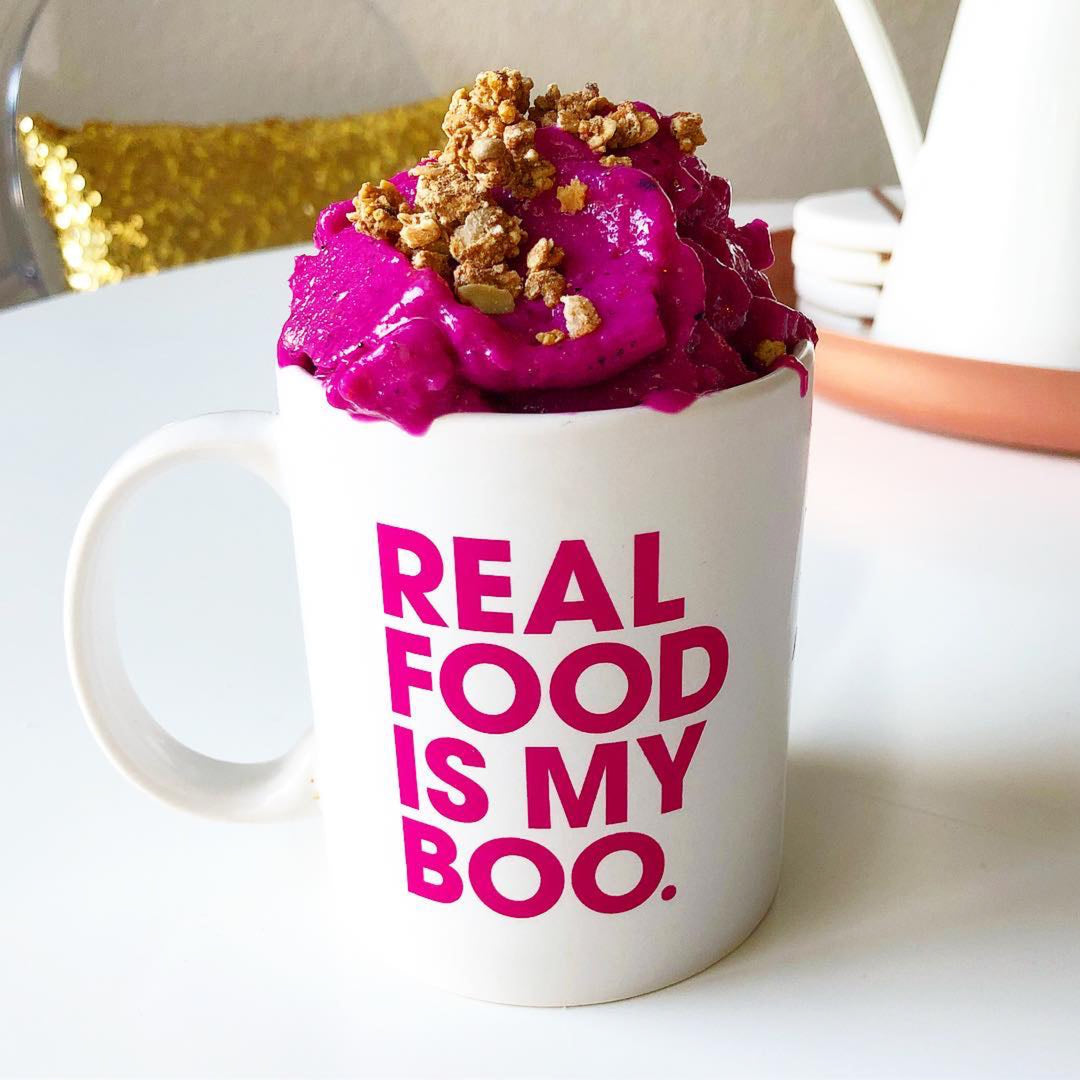 Paleo treats granola in real food is my boo mug with dragonfruit whipped cream.