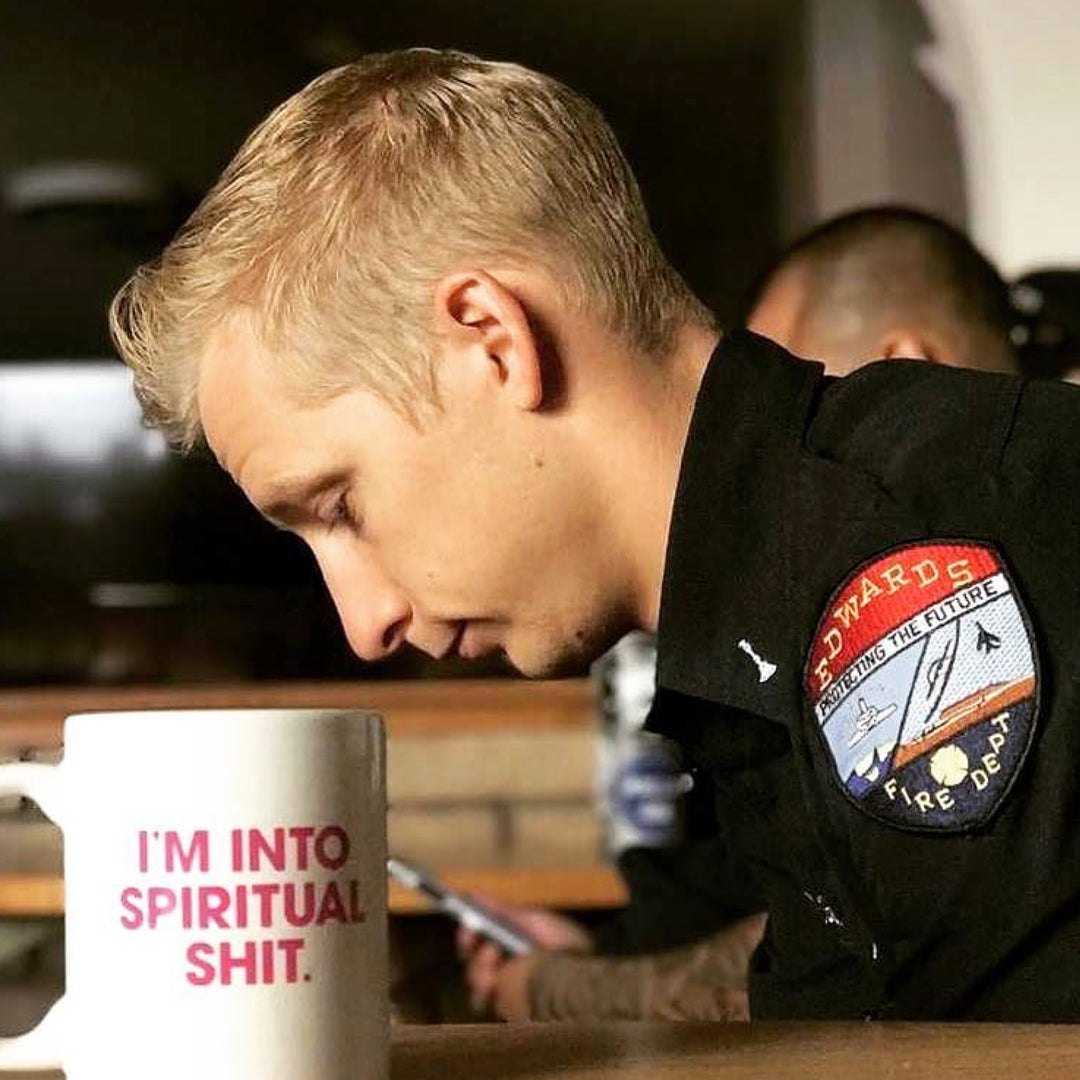 Rocket fireman meditates prior to eatin.