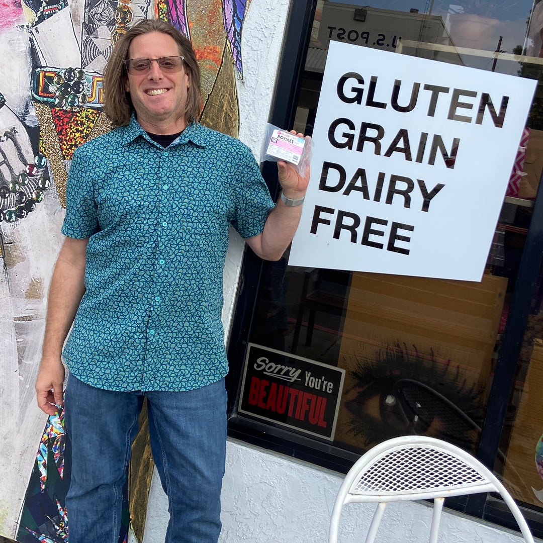 Ryan from collective wellness on adams with an espresso brownie from paleo treats.