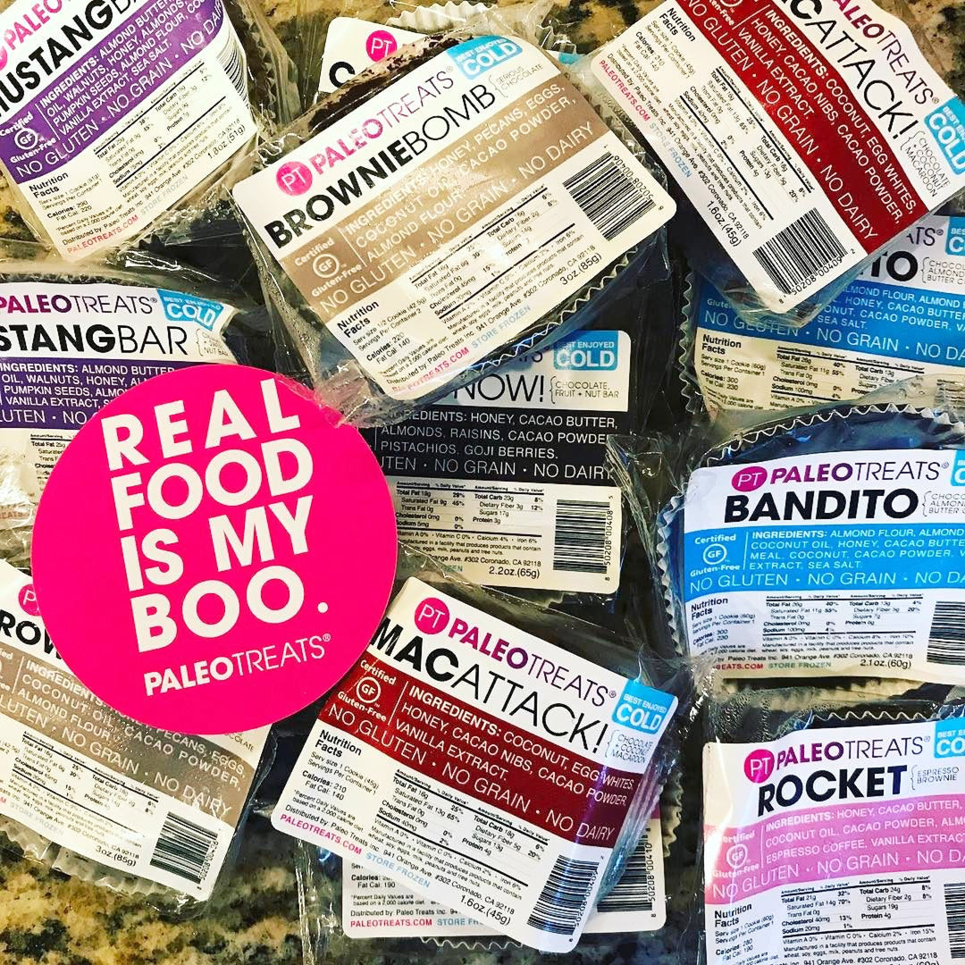 Small stack sampler real food boo sticker over a box full of paleo desserts by Paleo Treats.