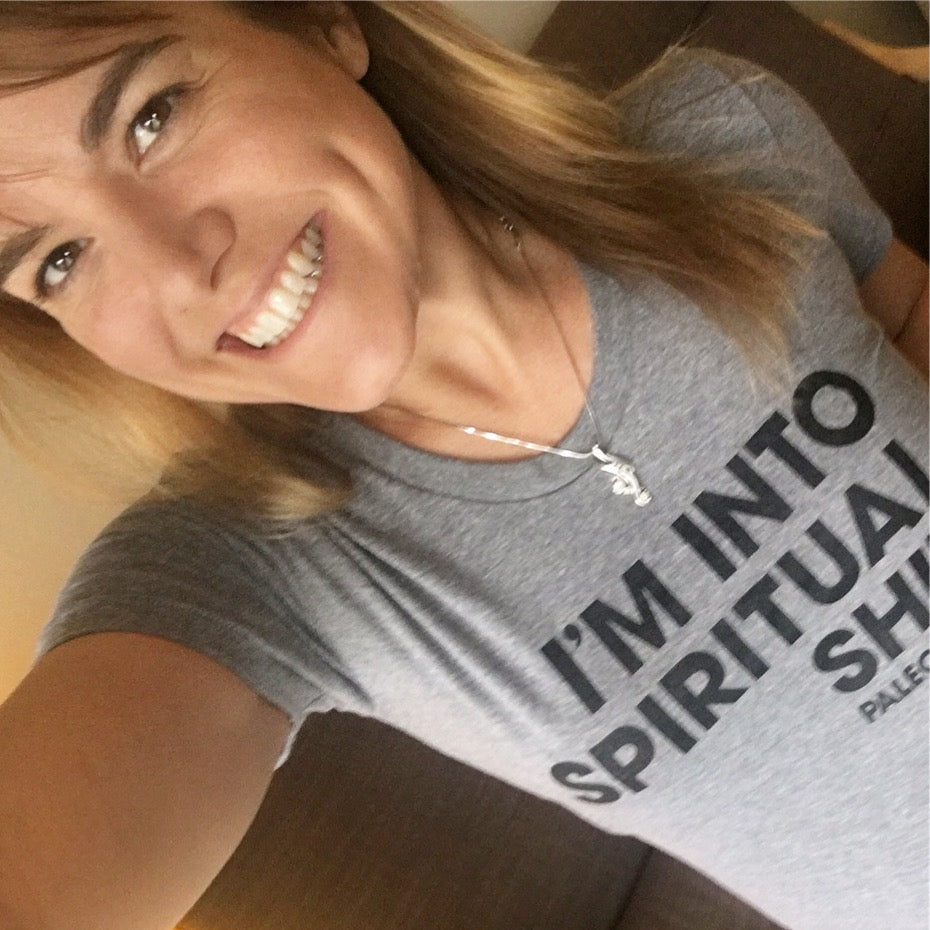 Smiling woman wears im into spiritual shit t shirt.