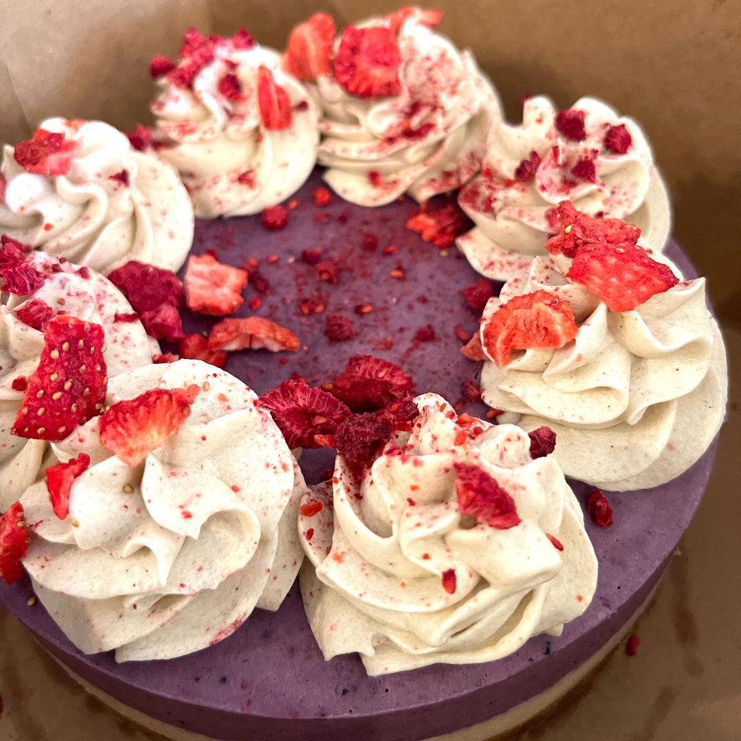 Vegan gf cake berry with cream on top dairy free by Paleo Treats.