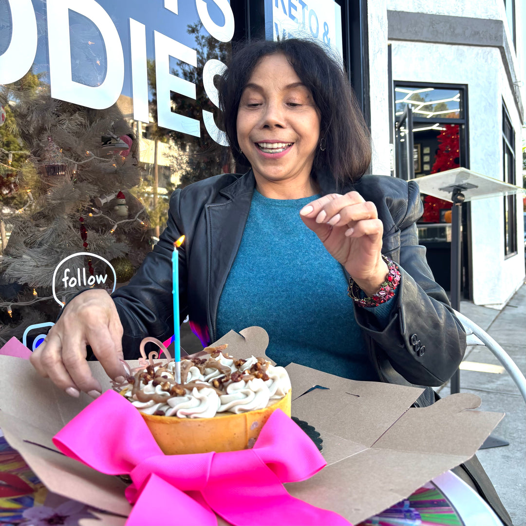 Vegan gf cake celebrating birthday on adams ave at store.