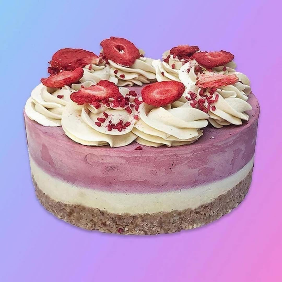 Vegan gf cake triple berry cream frosting cake by Paleo Treats.
